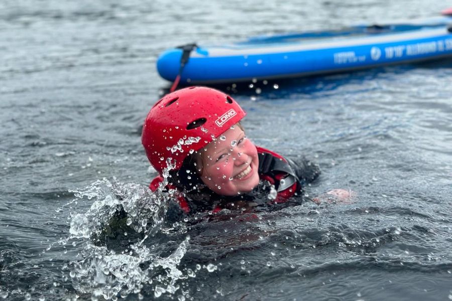 Girl swimming in a lake