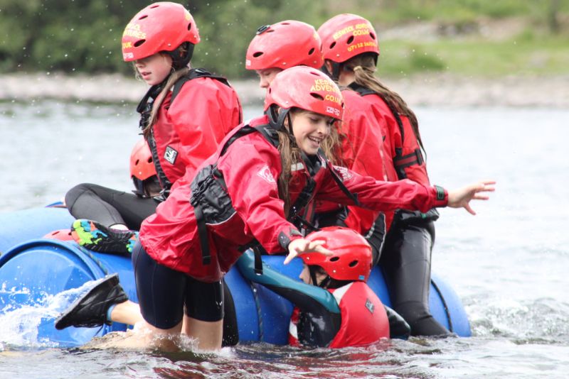 Girl falling of a raft into Derwentwater