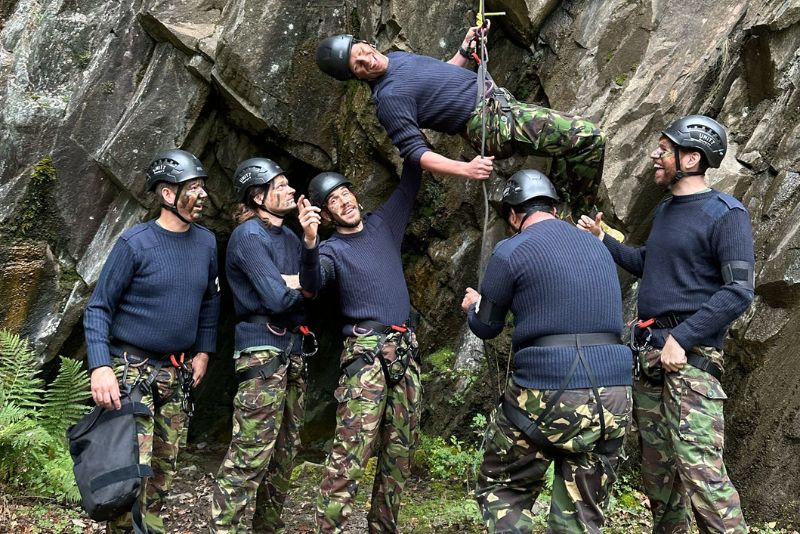 A stag do group abseiling