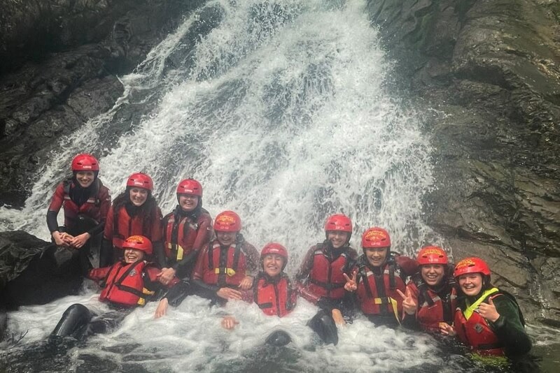 Group at the bottom of a canyon in Coniston