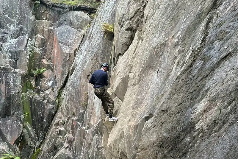 Man rock climbing in a quarry