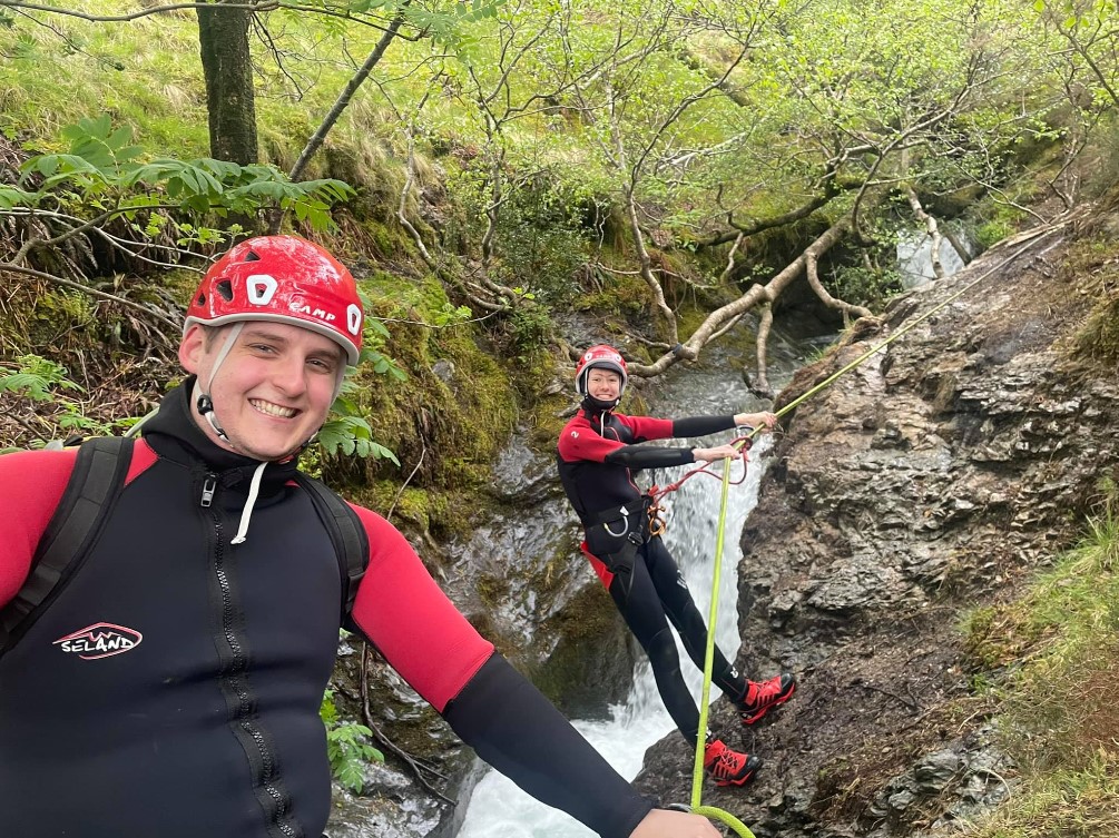 A couple canyoning