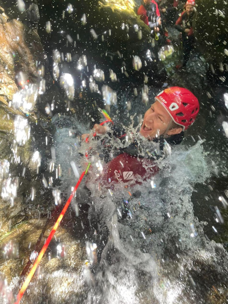 Man getting splashed by water in the ghyll