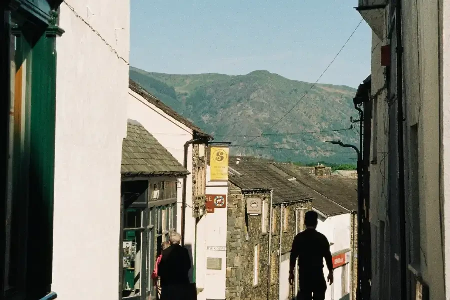 Shops in Keswick with mountains in the background