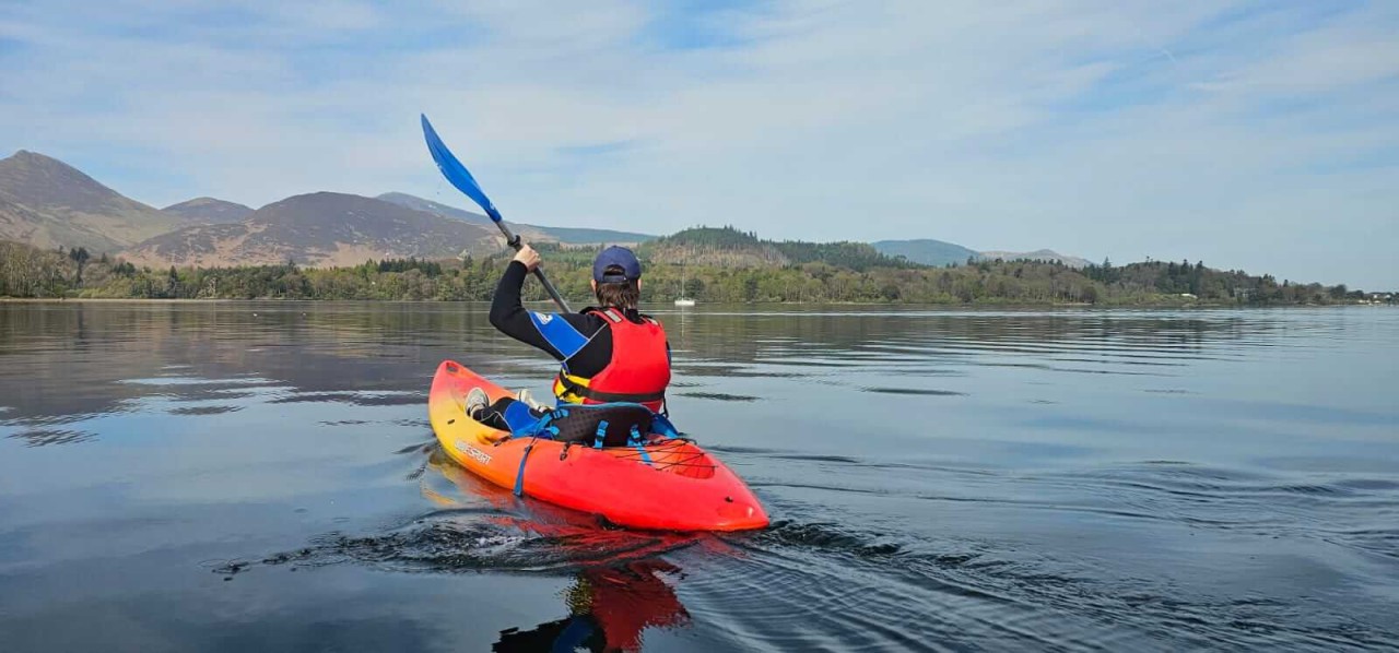 Person kayaking on Derwentwater